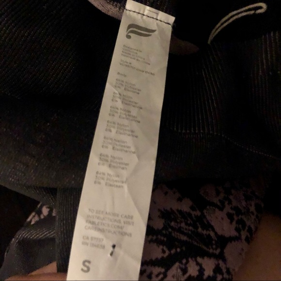 Fabletics Mid-Rise Purple Butterfly 7/8 Leggings - Picture 13 of 13